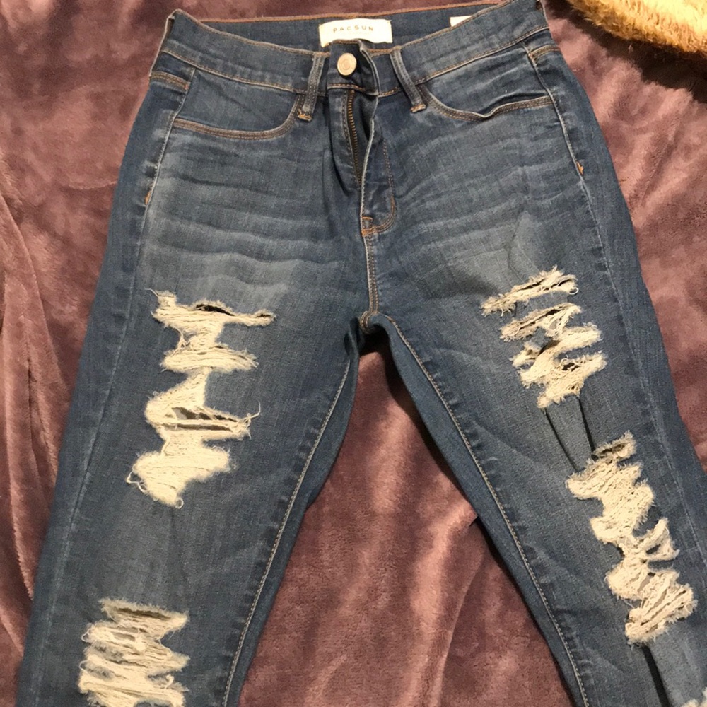 blue ripped jeans